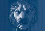A close up of a stone lion head, the mascot of Columbia University