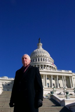 Photo of Robert C. Worrest in front of U.S. Capitol